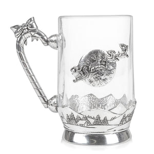 Our Glass Tankards are a modern, mixed media take on the traditional Pewter Tankards we all know and love.  This specific design features a Christmas scene showing Santa and his reindeer at work.