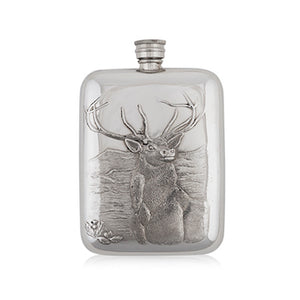 One of the designs from our Luxury Pewter Hip flasks showing an embossed image of a Highland stag with mountains in the background. They are a beautiful idea for storing your drink.