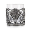 A glass tumbler with a pewter design welded to the glass, this specific design consists of a beautiful Highland cow and Thistle design clinging to the glass. 