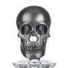 A skull made from pewter in the UK used as a stopper on top of our skull decanter.