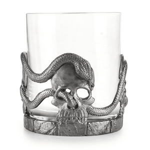Skull and snake whisky tumbler made from pewter in the UK. The snake is shown wrapping around the glass and weaving in and out the skull design. 