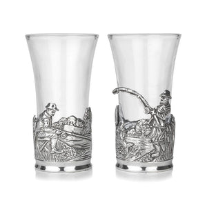 A Pewter design of which wraps itself around the Shot Glass and is able to be released so that the glass can be washed.  This specific design consists of a beautiful design featuring a man fishing.