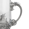 A tankard made from glass and pewter This specific design features a Viking Scene, showing a Viking warrior and longboat. 